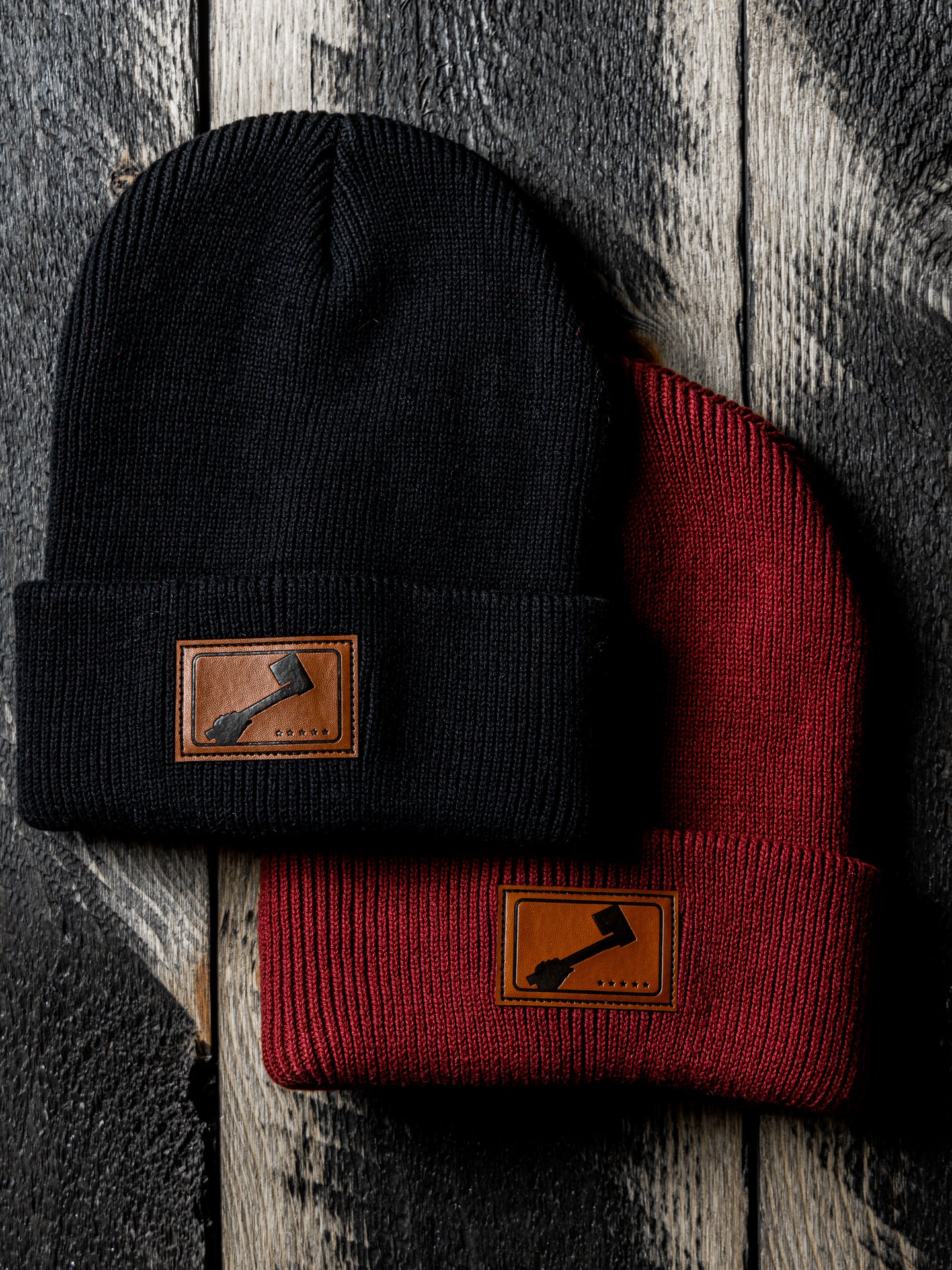 Red and Black Beanie Hat Close-Up with Leather Patch